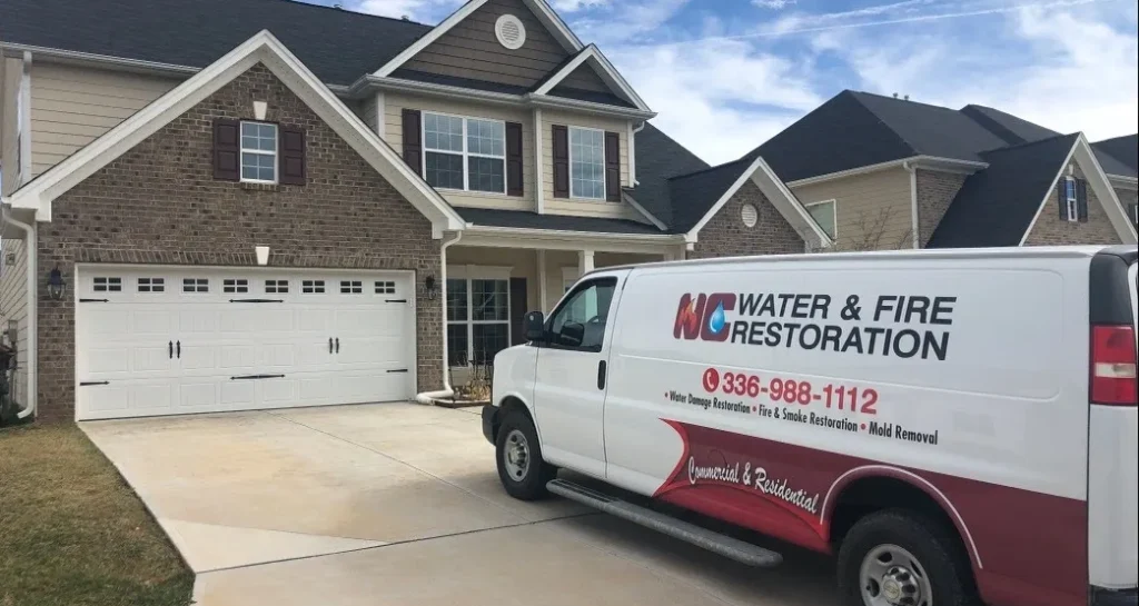 NC Water & Fire Restoration company van in front of residence to asses fire and smoke damage restoration